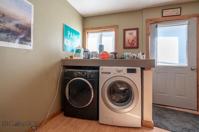 124 S M St, Livingston, MT 59047 - washroom with separate washer and dryer, laundry area, plenty of natural light, and light wood-style flooring