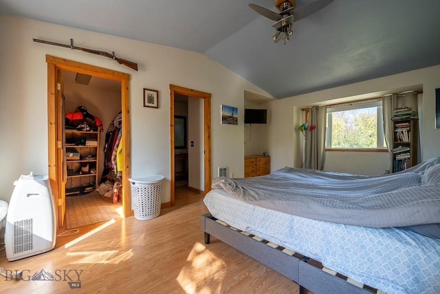 124 S M St, Livingston, MT 59047 - bedroom featuring ceiling fan, a walk in closet, light wood finished floors, lofted ceiling, and a closet
