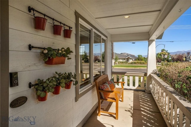 balcony featuring a porch