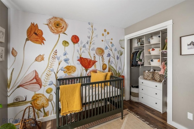bedroom featuring a closet and wood finished floors