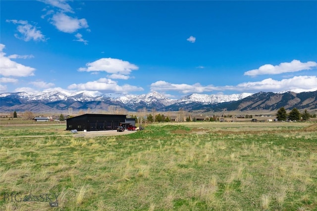 view of mountain feature featuring a rural view