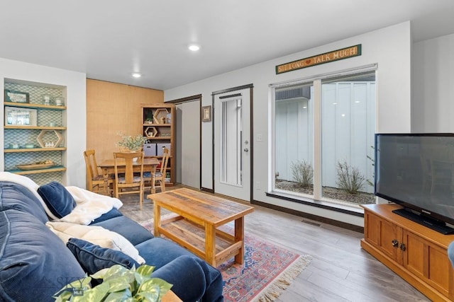 2448 Gallatin Green Blvd Unit F, Bozeman, MT 59718 - living area with recessed lighting, wood finished floors, and visible vents