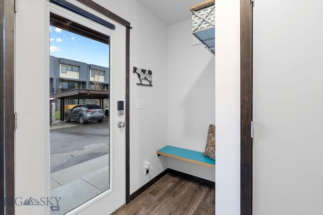 2448 Gallatin Green Blvd Unit F, Bozeman, MT 59718 - mudroom featuring dark wood-style flooring, baseboards, and visible vents
