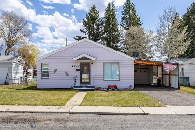 2300 S Dr, Butte, MT 59701 - bungalow-style home with fence, a front yard, and aphalt driveway