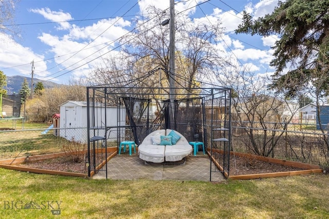 2300 S Dr, Butte, MT 59701 - view of shed with fence and a trampoline