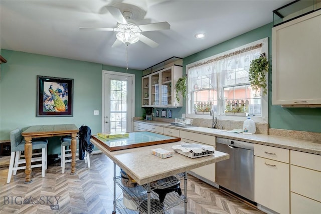 623 N Grand Ave, Bozeman, MT 59715 - kitchen with a sink, dishwasher, light countertops, a ceiling fan, and recessed lighting