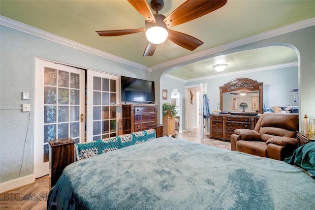 623 N Grand Ave, Bozeman, MT 59715 - bedroom with crown molding, arched walkways, baseboards, and a ceiling fan