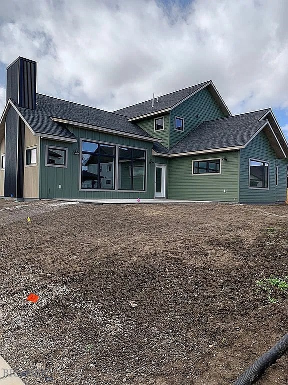 51 W Granite Peak, Bozeman, MT 59718 - back of house with a chimney