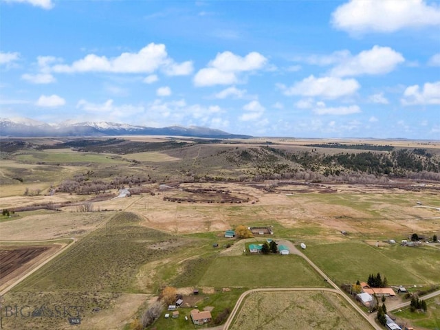 bird's eye view with a mountain view and a rural view