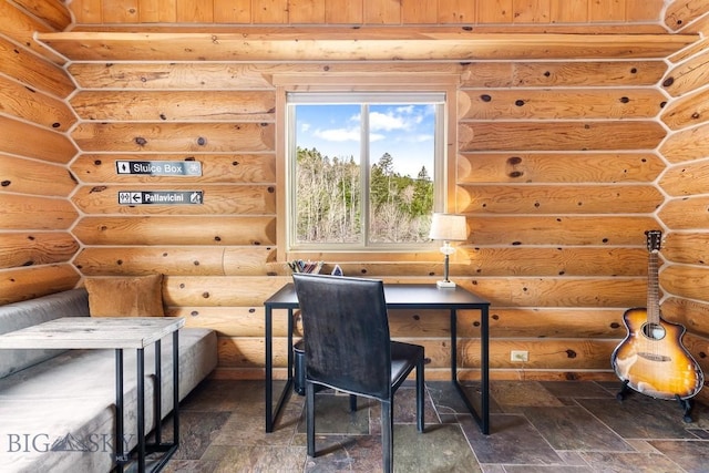 office space featuring stone tile floors and log walls