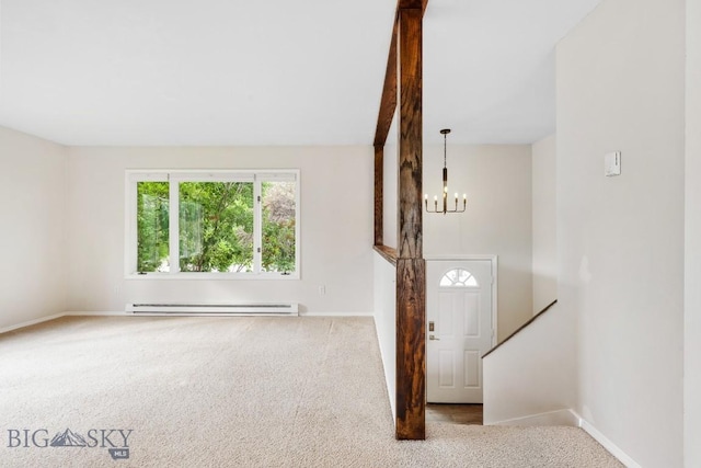 interior space with baseboards, an inviting chandelier, and baseboard heating