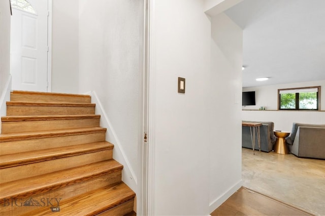 stairway with baseboards