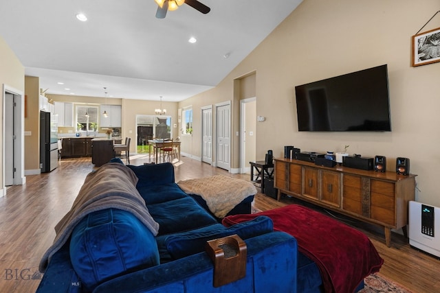 1604 Drummond Blvd, Belgrade, MT 59714 - living area with recessed lighting, baseboards, ceiling fan with notable chandelier, and wood finished floors