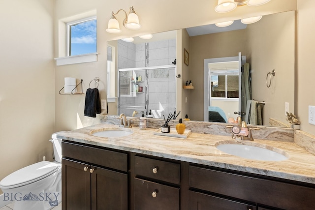1604 Drummond Blvd, Belgrade, MT 59714 - ensuite bathroom featuring a sink, plenty of natural light, and a shower stall