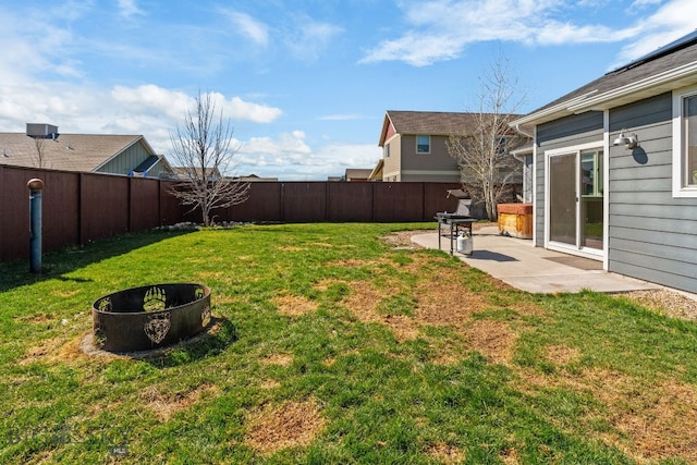 1604 Drummond Blvd, Belgrade, MT 59714 - view of yard with a patio, a fenced backyard, and an outdoor fire pit