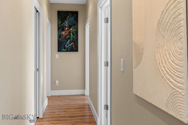 1604 Drummond Blvd, Belgrade, MT 59714 - corridor with baseboards and wood finished floors