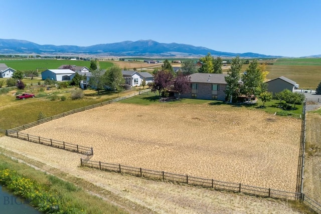 aerial view featuring a rural view and a mountain view