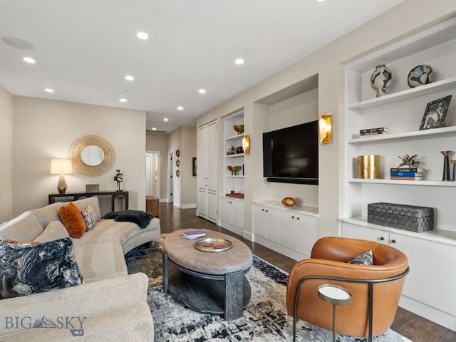 living room featuring recessed lighting, built in features, baseboards, and dark wood-style floors
