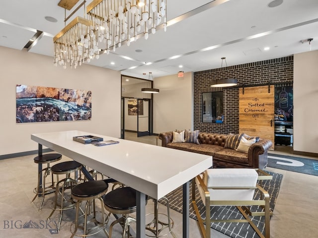 interior space with baseboards, recessed lighting, and an accent wall