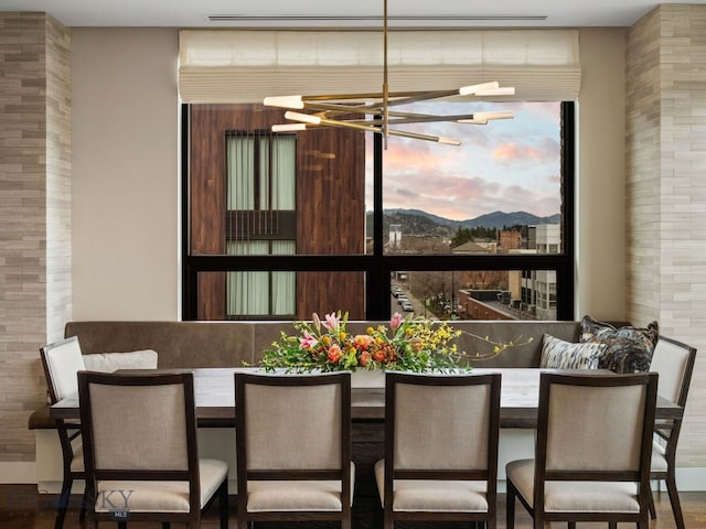 interior space with a chandelier and a mountain view