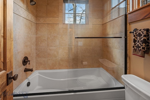 full bathroom with toilet and shower / washtub combination