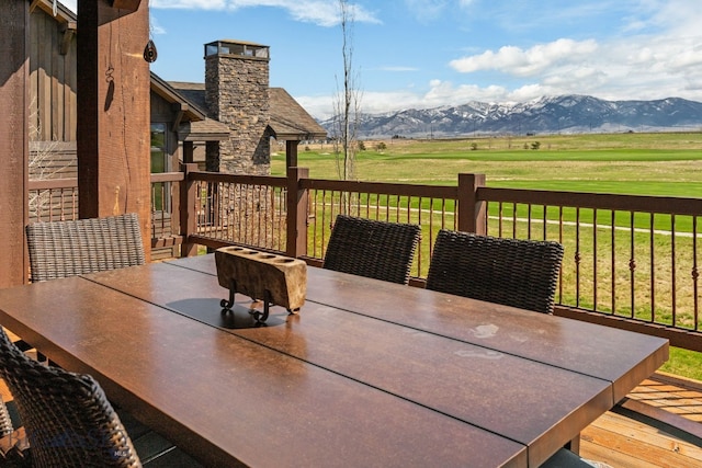 deck with a mountain view