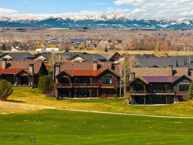 drone / aerial view with a mountain view and a residential view