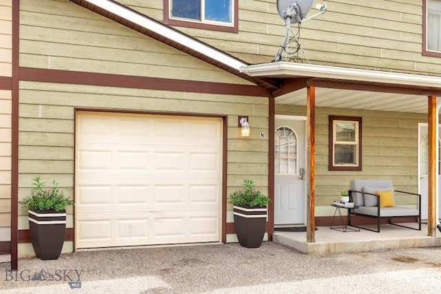 1010 Cruiser Ln Unit N, Belgrade, MT 59714 - property entrance featuring covered porch and an attached garage