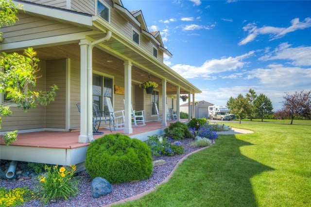 view of property exterior with a lawn and covered porch