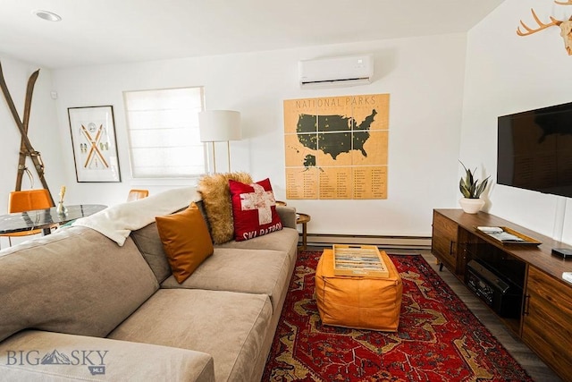 living room featuring a wall unit AC, a baseboard heating unit, and wood finished floors