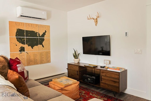 living room featuring wood finished floors, baseboards, a wall unit AC, and a baseboard heating unit