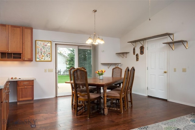 dining room featuring baseboards, an inviting chandelier, dark wood finished floors, and vaulted ceiling