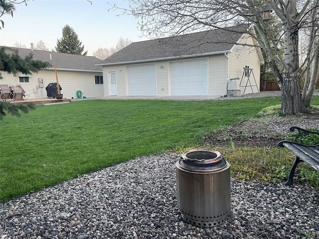 view of yard featuring a garage