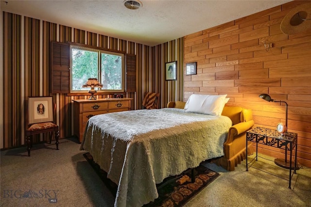 423 Riverview Ct, Great Falls, MT 59404 - bedroom with carpet floors, wooden walls, and a textured ceiling