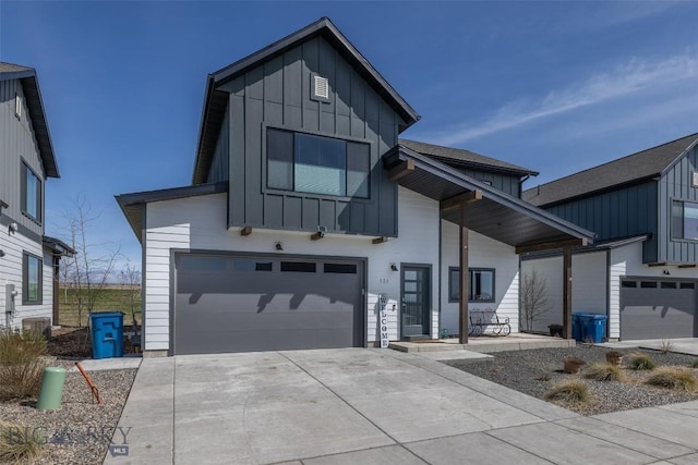 modern farmhouse featuring board and batten siding, an attached garage, driveway, and central AC unit