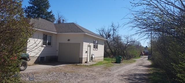 716 13th Ave S, Bozeman, MT 59715 - view of property exterior with dirt driveway