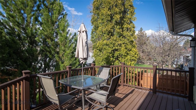 417 Henry Dr, Belgrade, MT 59714 - wooden terrace featuring outdoor dining area