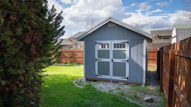 417 Henry Dr, Belgrade, MT 59714 - view of shed featuring a fenced backyard