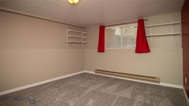 417 Henry Dr, Belgrade, MT 59714 - carpeted spare room featuring baseboard heating and baseboards