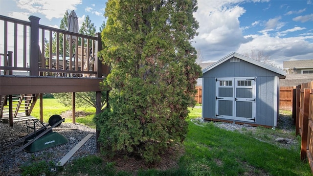 417 Henry Dr, Belgrade, MT 59714 - view of yard featuring a storage unit, stairway, and a wooden deck