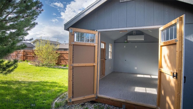 417 Henry Dr, Belgrade, MT 59714 - view of outdoor structure featuring a wall mounted air conditioner