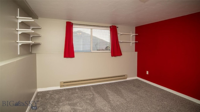 417 Henry Dr, Belgrade, MT 59714 - spare room with carpet floors, baseboards, and baseboard heating