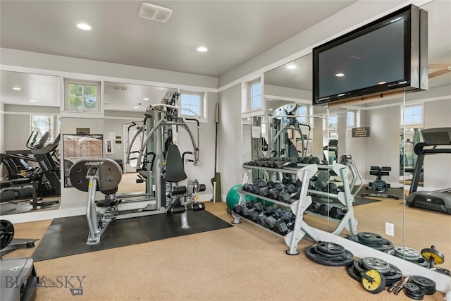 gym featuring plenty of natural light and recessed lighting