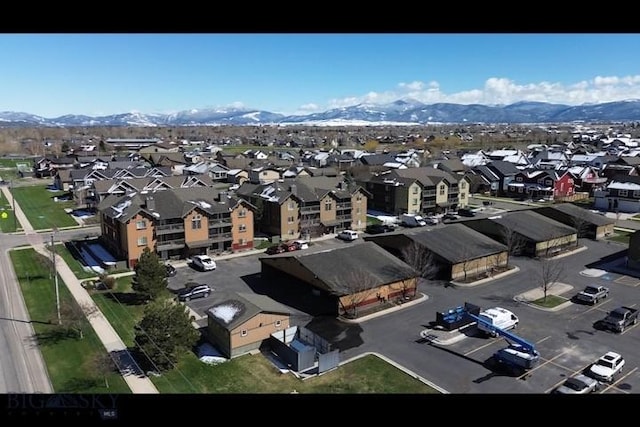 4635 Bembrick St Unit 1B, Bozeman, MT 59718 - drone / aerial view featuring a residential view and a mountain view