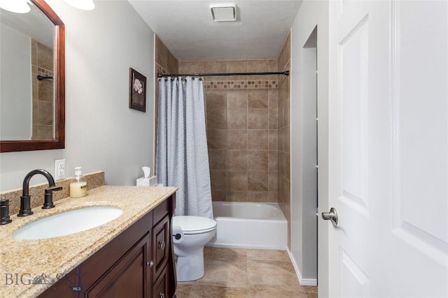 full bathroom featuring vanity, tile patterned flooring, toilet, and shower / bath combination with curtain