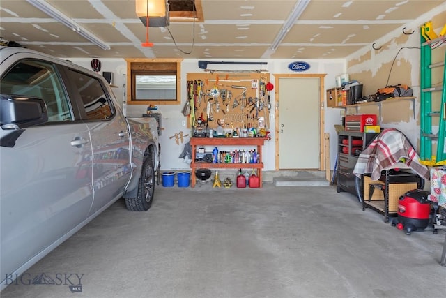 garage with a workshop area