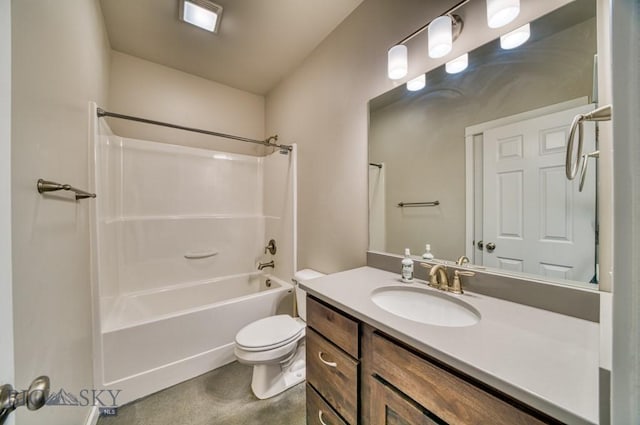 full bathroom featuring vanity, washtub / shower combination, and toilet