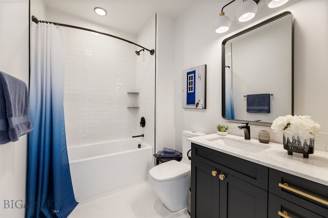 bathroom featuring vanity, toilet, tile patterned floors, and shower / bath combo