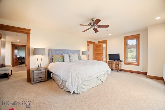 bedroom with recessed lighting, a ceiling fan, baseboards, and light carpet