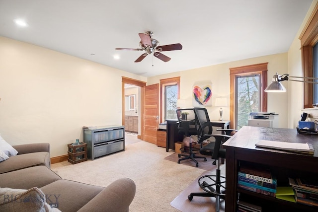 office space featuring light colored carpet, recessed lighting, and ceiling fan